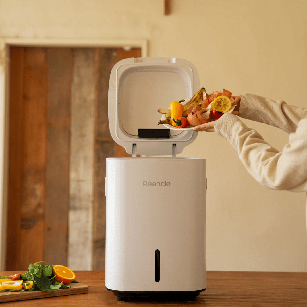 A Reencle food recycler on a kitchen counter